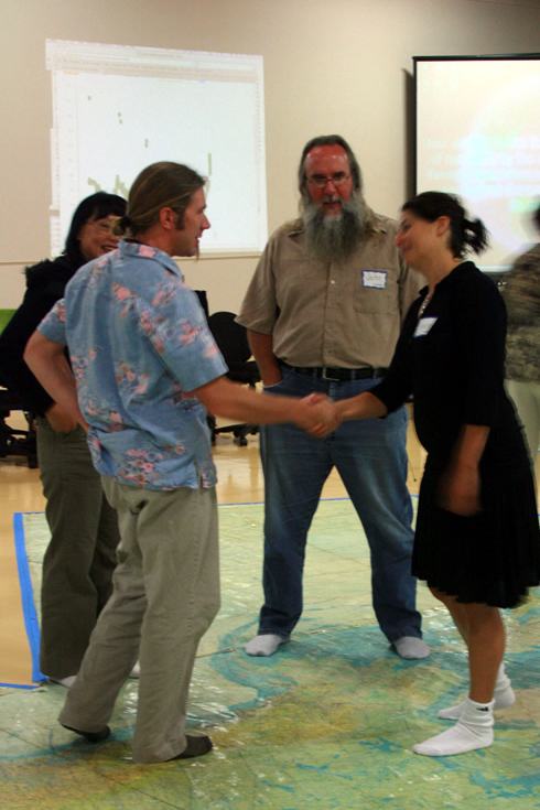 Monty Worthington meets Tracy Hughes on the map with Jacky Chan and John Graham 