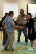 Monty Worthington meets Tracy Hughes on the map with Jacky Chan and John Graham looking on. Monty Worthington meets Tracy Hughes on the map with Jacky Chan and John Graham